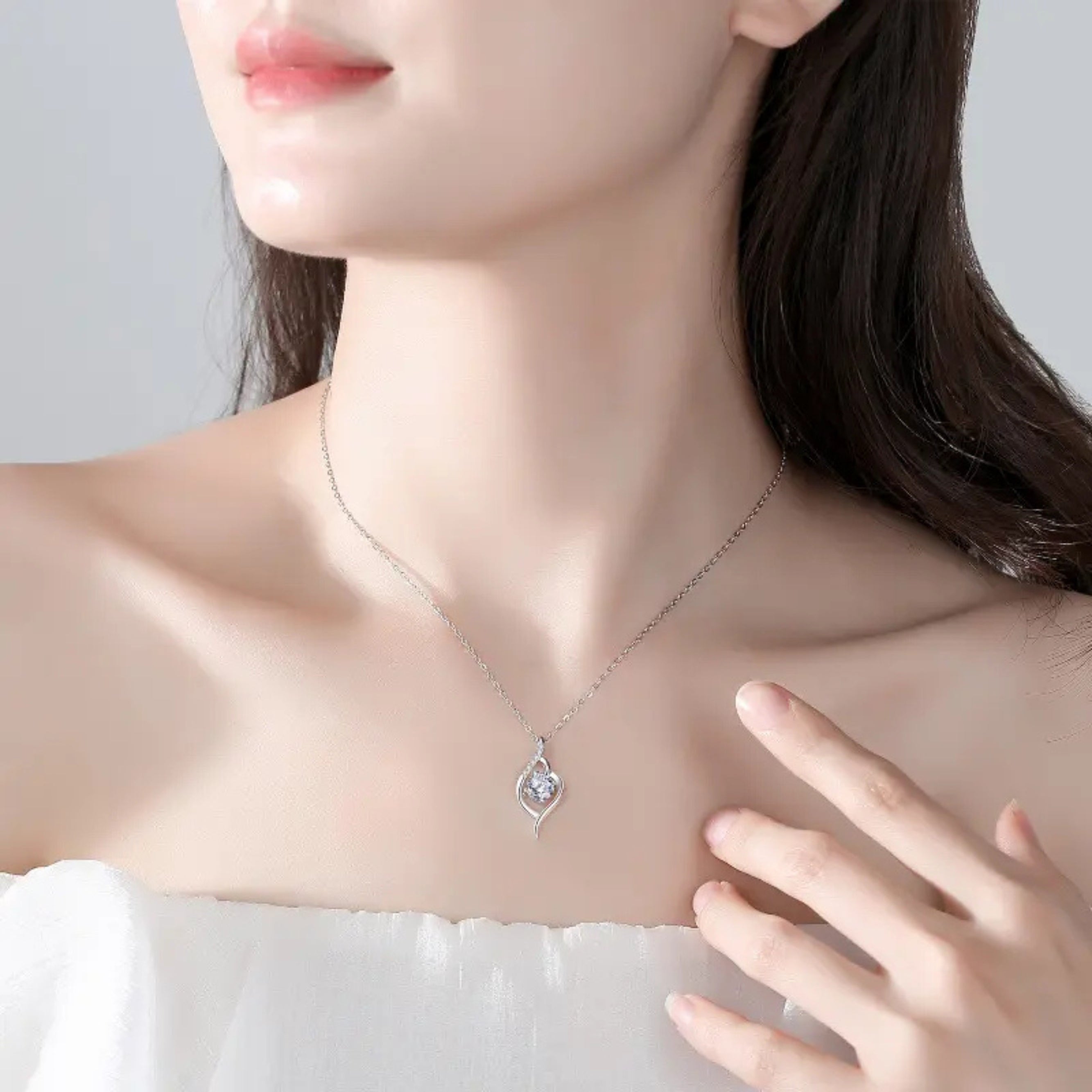 1.0ct.tw Round Moissanite Infinity Twist Solitaire Pendant Necklace Moissanite