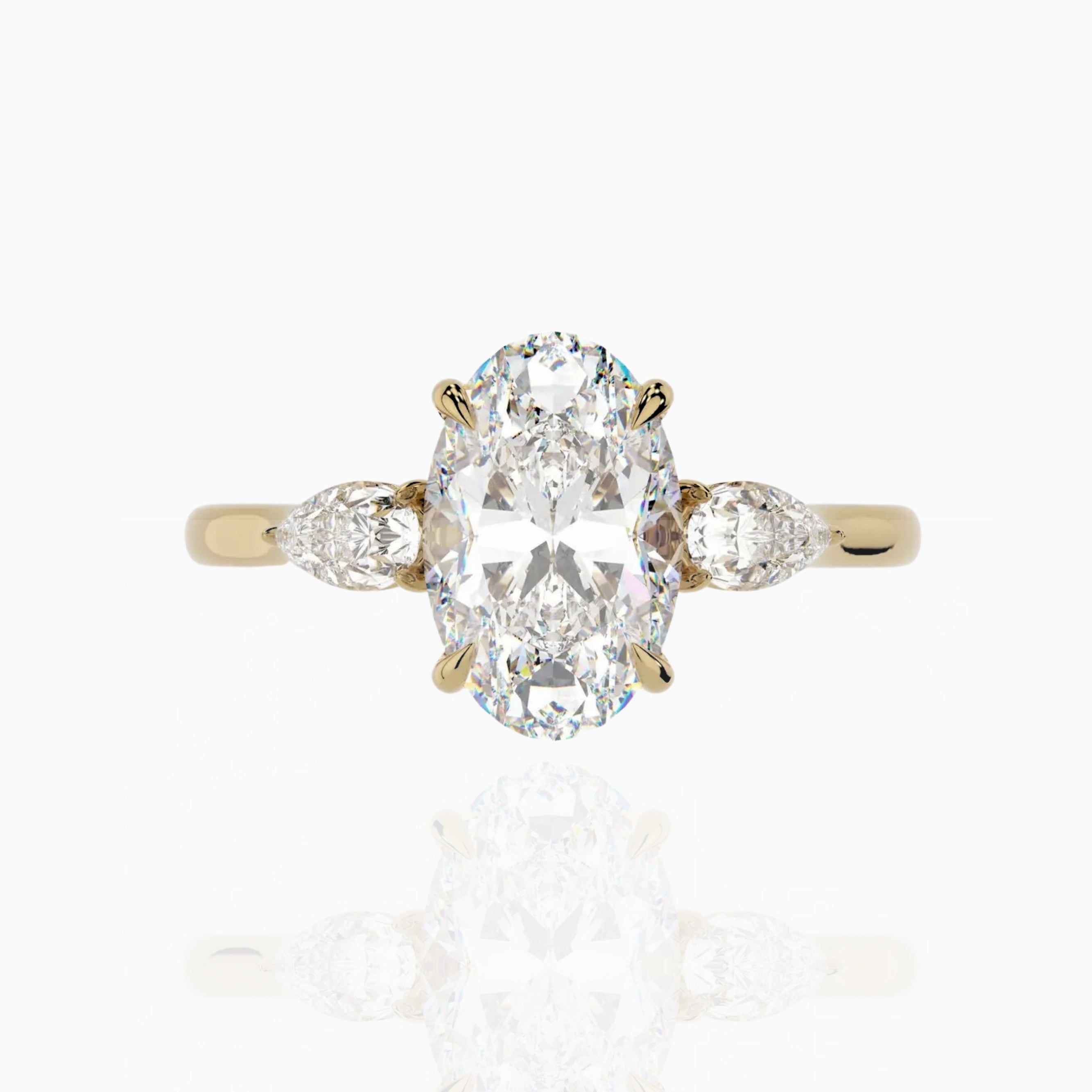 Oval & Pear Moissanite Three Stone Engagement Ring 3.00ct.tw 18K Yellow Gold Plated 3.00ct | 7x9mm 7 Moissanite