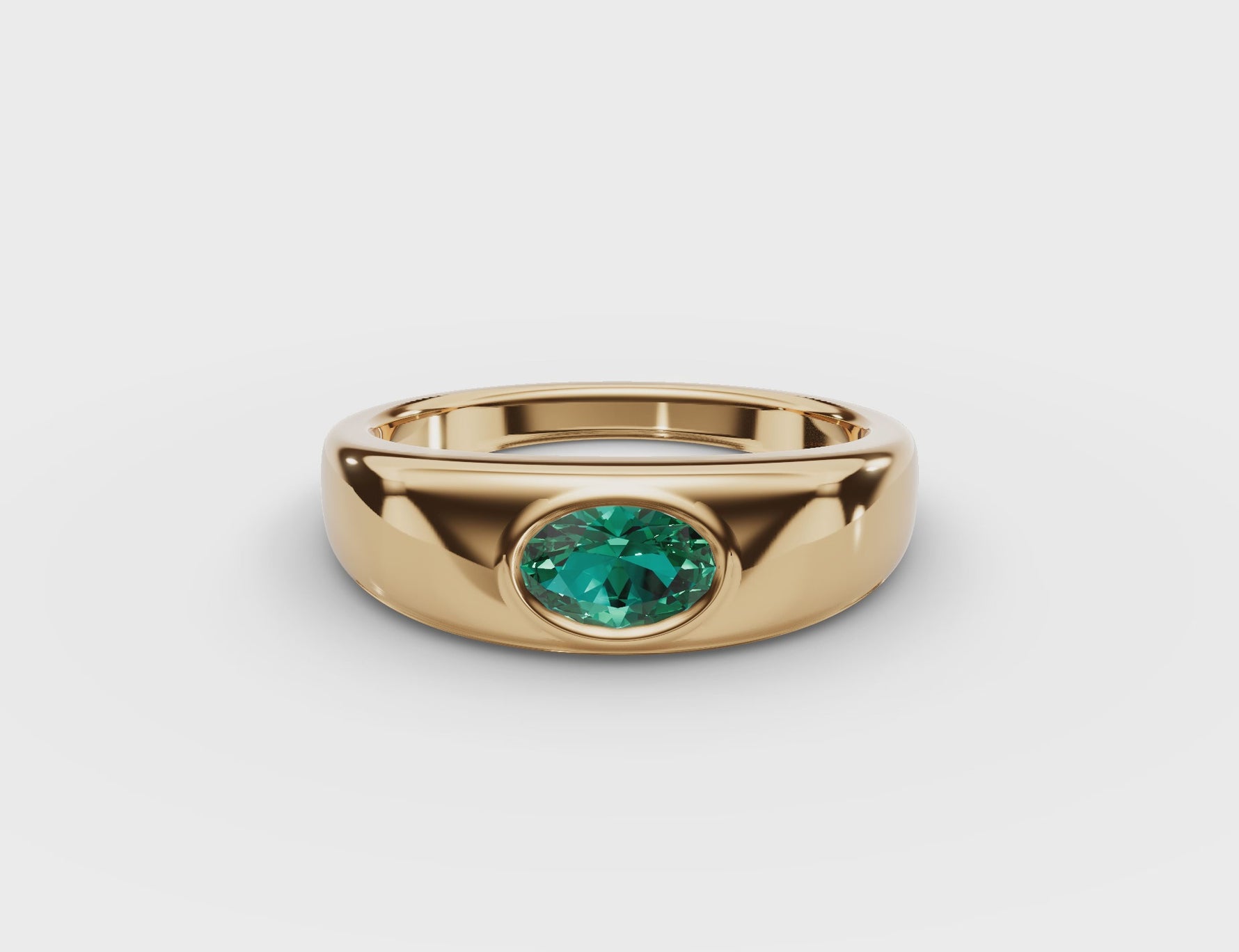 Bezel-Set Oval Emerald Ring 