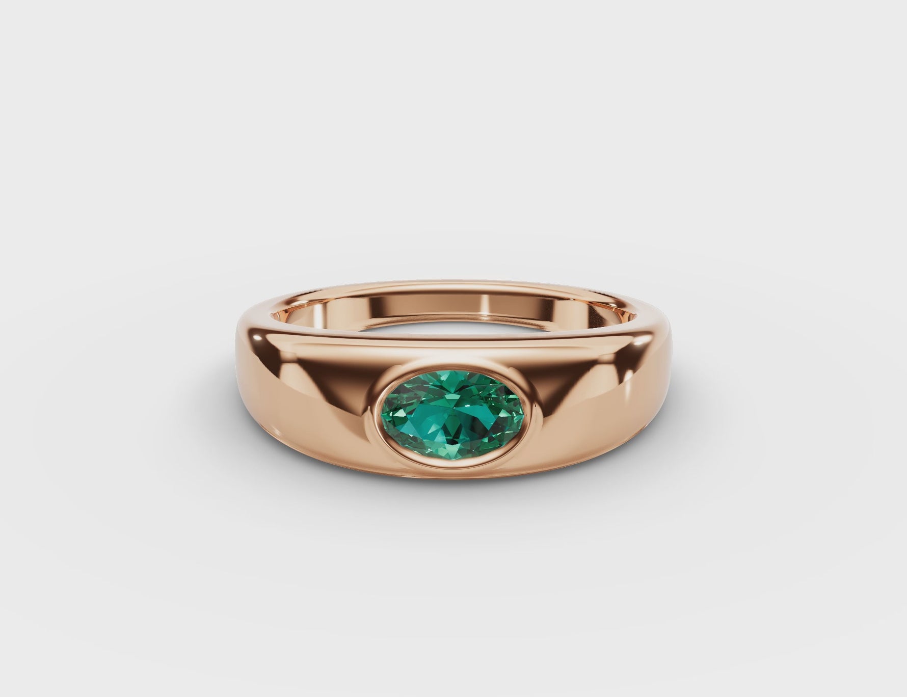 Bezel-Set Oval Emerald Ring 
